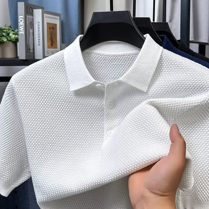 Loose fit pure cotton short sleeve pullover sweater in grey on a hanger.
