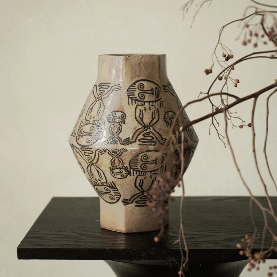 Hand-painted ceramic vase with tribal totem flower designs and vintage carved art patterns