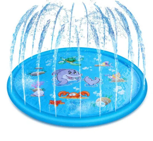 Blue PVC children's water spray mat with marine animal designs laid on grass, connected to a garden hose.
