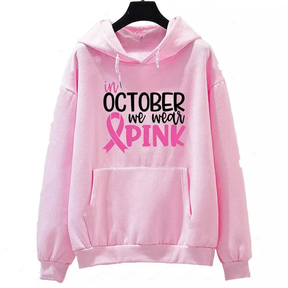 Retro art print on a pullover hoodie with long sleeves and a side seam pocket.