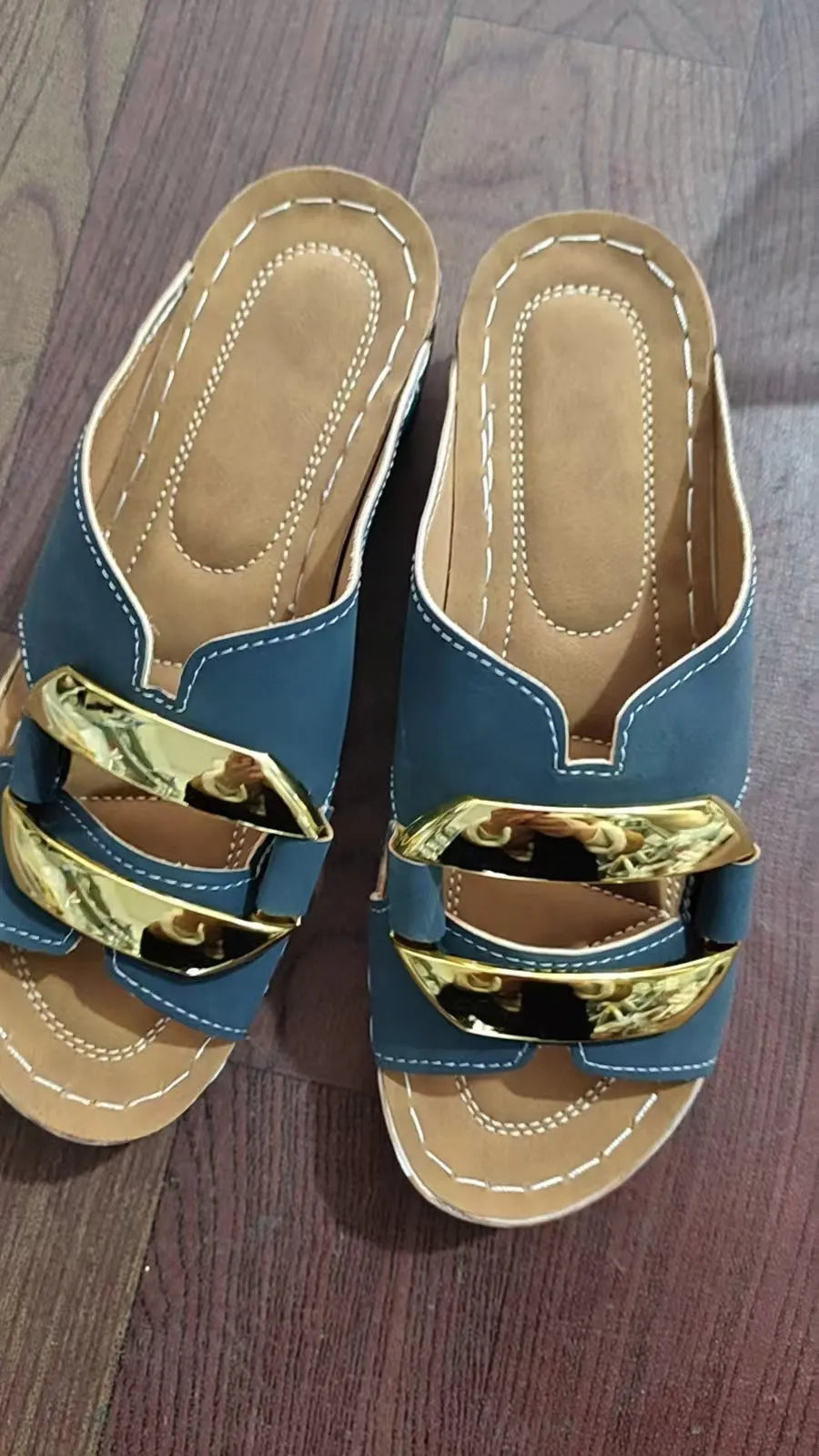 Roman style platform flip-flops in black, white, khaki, or sea blue with a rubber sole.