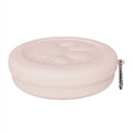 Portable dog food bowl with snack box compartment in light pink and light green colours