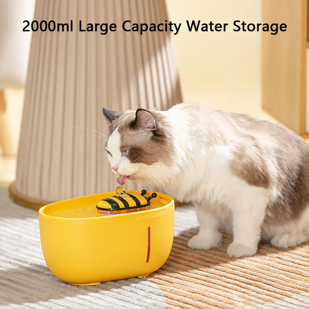 Yellow cat water fountain with filter, water level window, and anti-slip base.