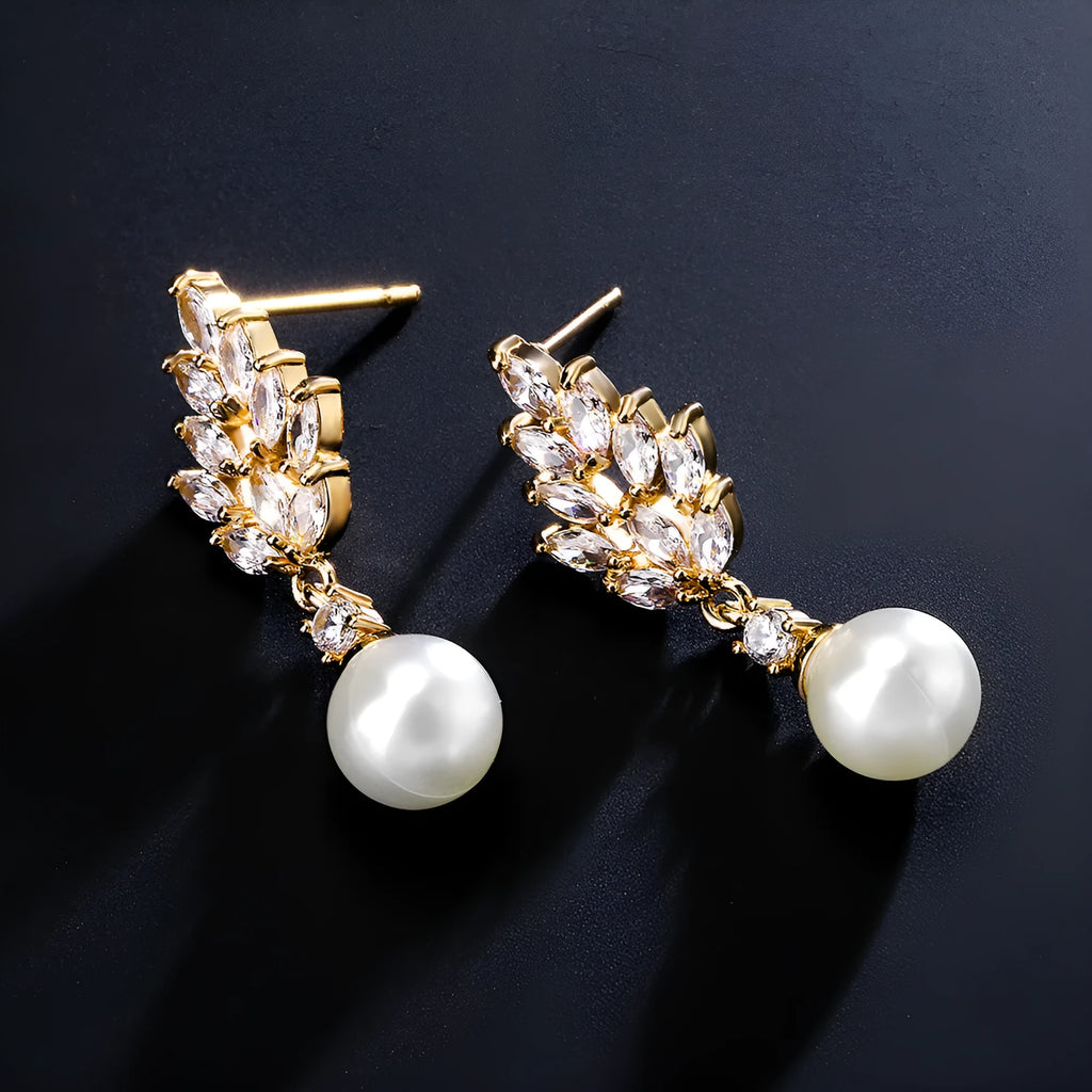 Geometric flower earrings with zircon stones and pearl accents in gold, white gold, or rose gold plating