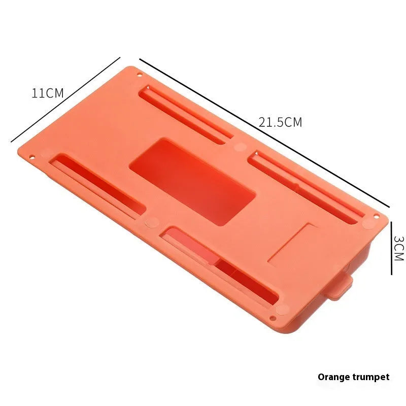 White plastic adhesive under desk storage drawer box with a lid and internal divider grid for organisation.