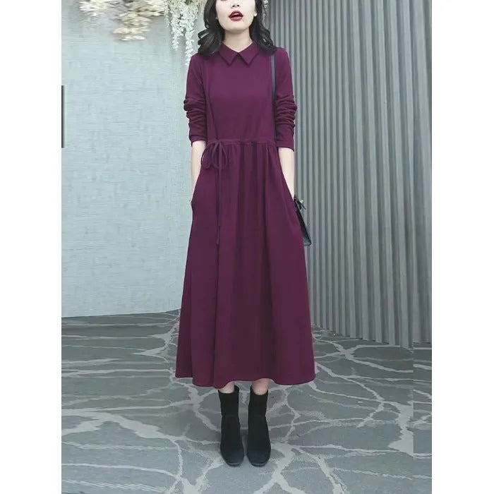 Purplish red plus size dress with extra long sleeves and long skirt for winter wear