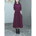 Purplish red plus size dress with extra long sleeves and long skirt for winter wear