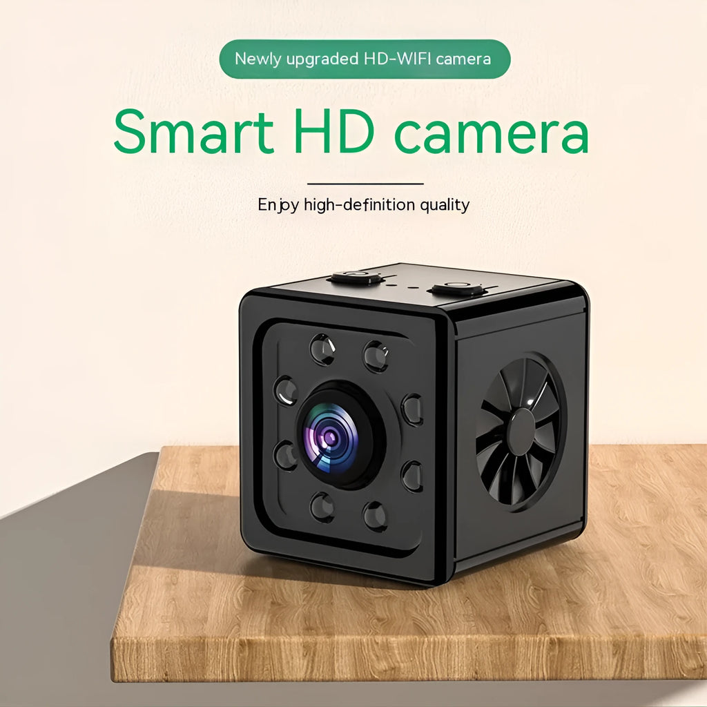 Black K13 network sports camera on its mounting bracket, showing compact cube design.