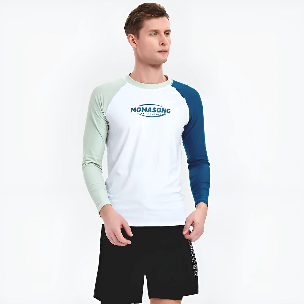 Men's white long-sleeve swim shirt and matching colour block swim trunks set on a man.
