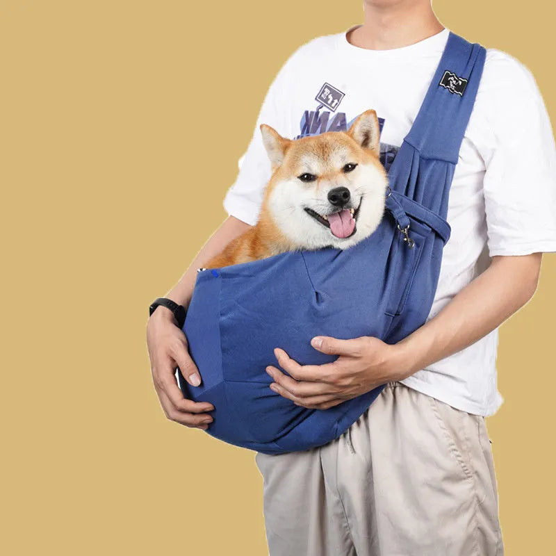 A folded and unfolded collapsible cat messenger bag with mesh panels, shown in blue.