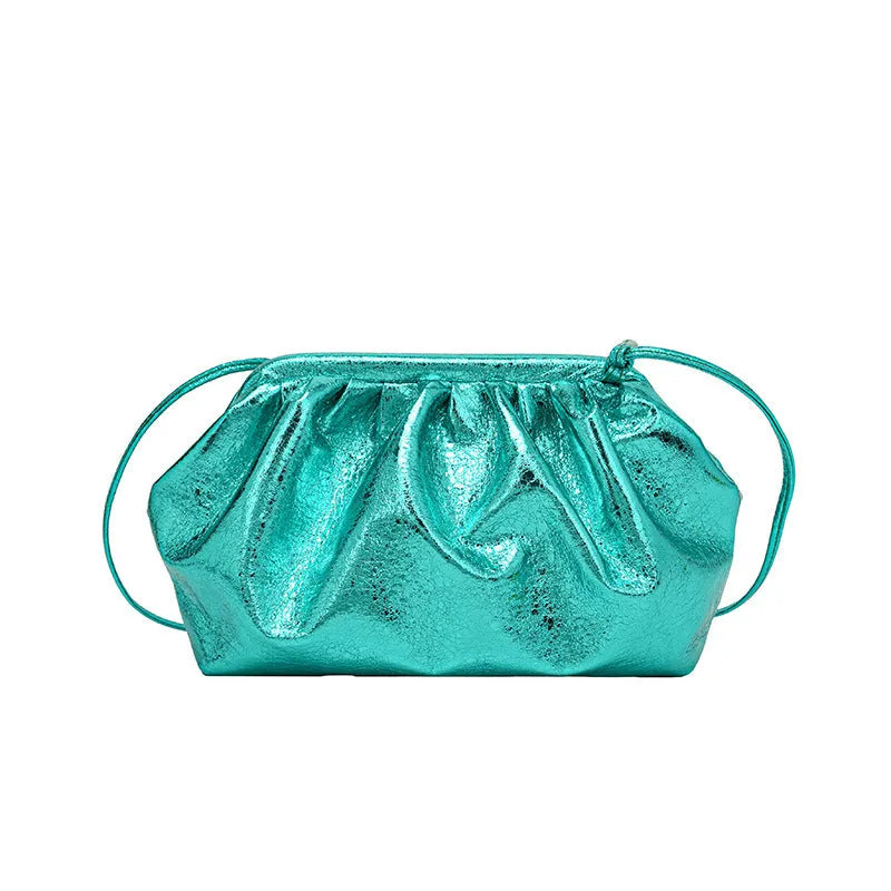 Simple hair clip fastening crossbody bag in shell shape, shown in rose red colour.