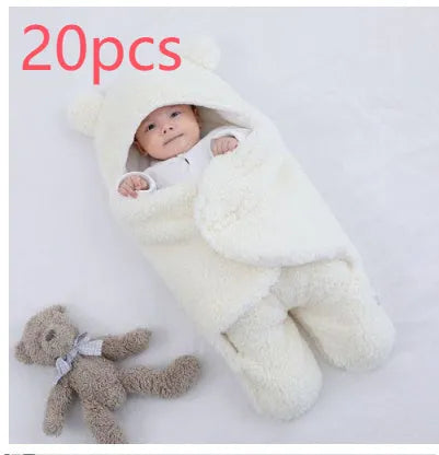Baby quilted sleeping bag wrapper in cotton blend fabric showing six colour options and three size measurements