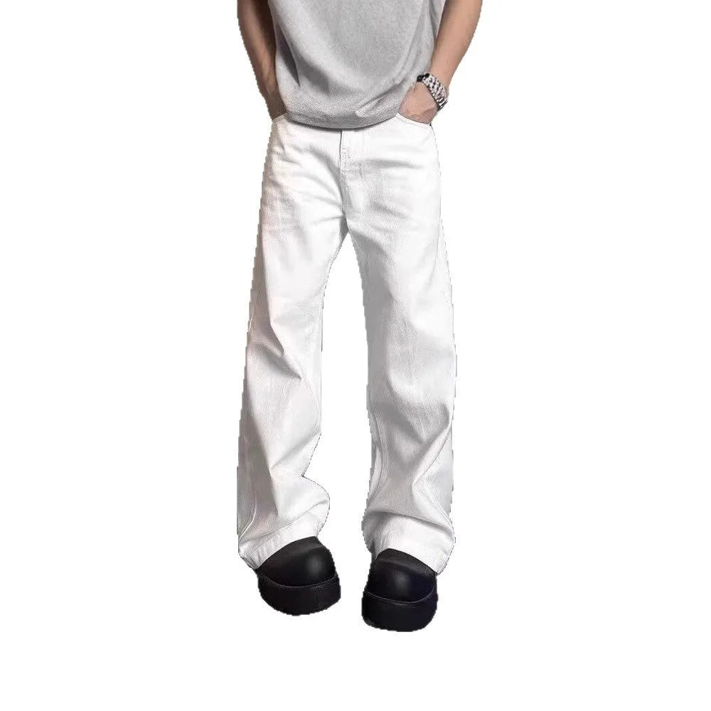 Men's white straight leg jeans with mid-waist zipper fly and loose wide leg cotton denim design