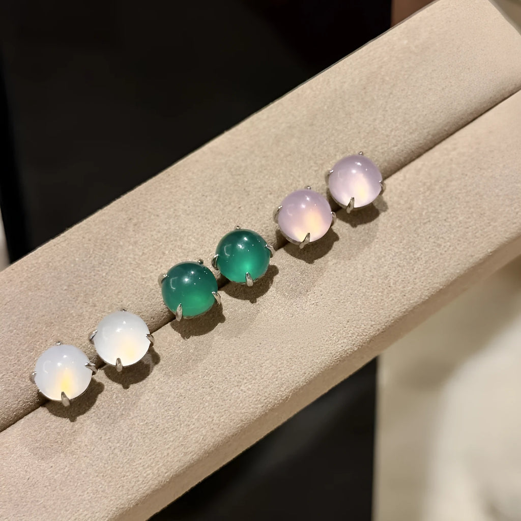 Chinese retro style chalcedony stud earrings with geometric round egg surface and four-claw stone setting