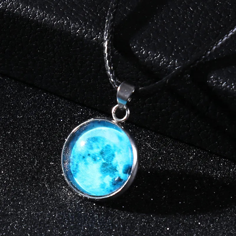 Luminous alloy unisex necklace with organic glass constellation pendant on adjustable glass chain.
