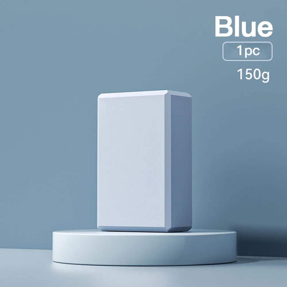 Solid colour EVA foam yoga block showing hexagonal facets and grip ridges