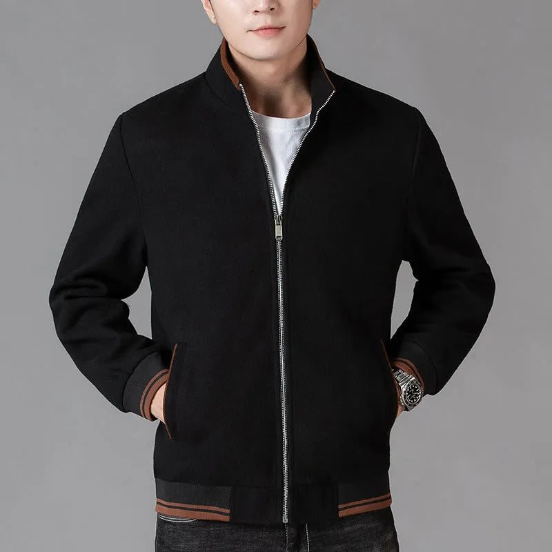 Men's grey zip-up fleece jacket with a stick pocket, shown in a sports style.