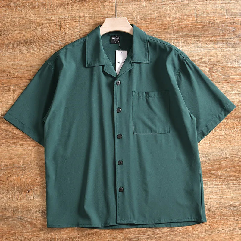 Men's loose fit short sleeve shirt in polyester cotton fabric, shown in army green colour