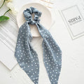 Long cloth ribbon hair tie with large intestine ring design in spring dark green colour