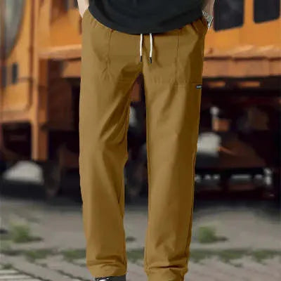 Men's lightweight polyester casual trousers in light grey colour shown flat