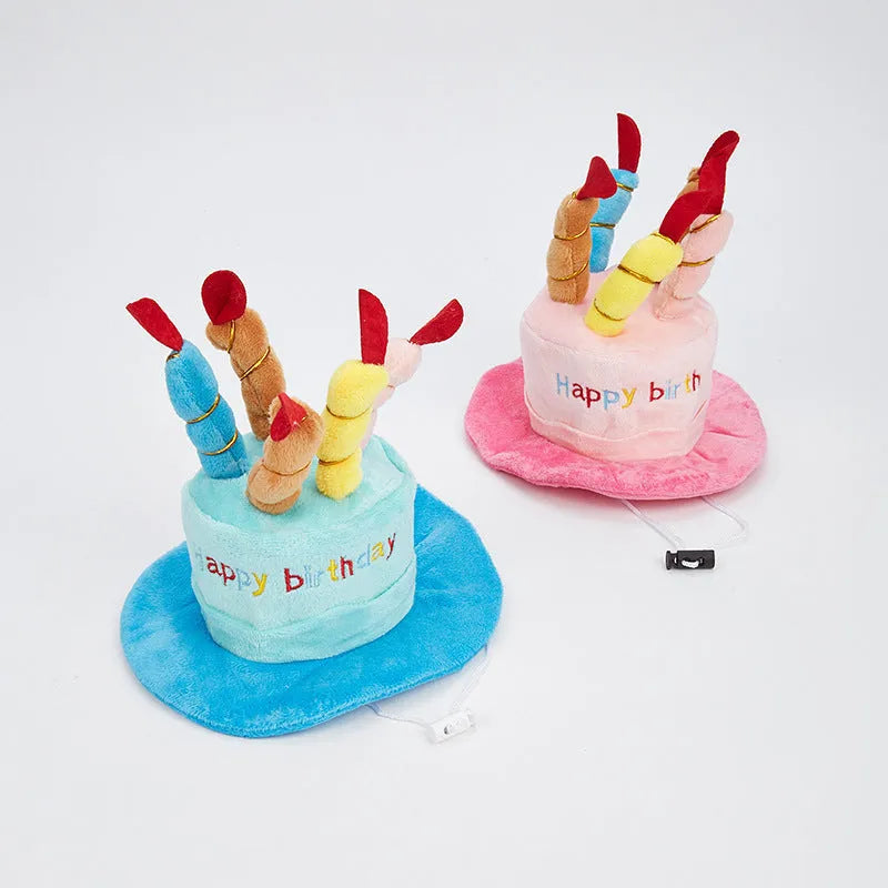 Blue and pink dog birthday hats showing dimensions of 21cm x 15cm x 6.5cm