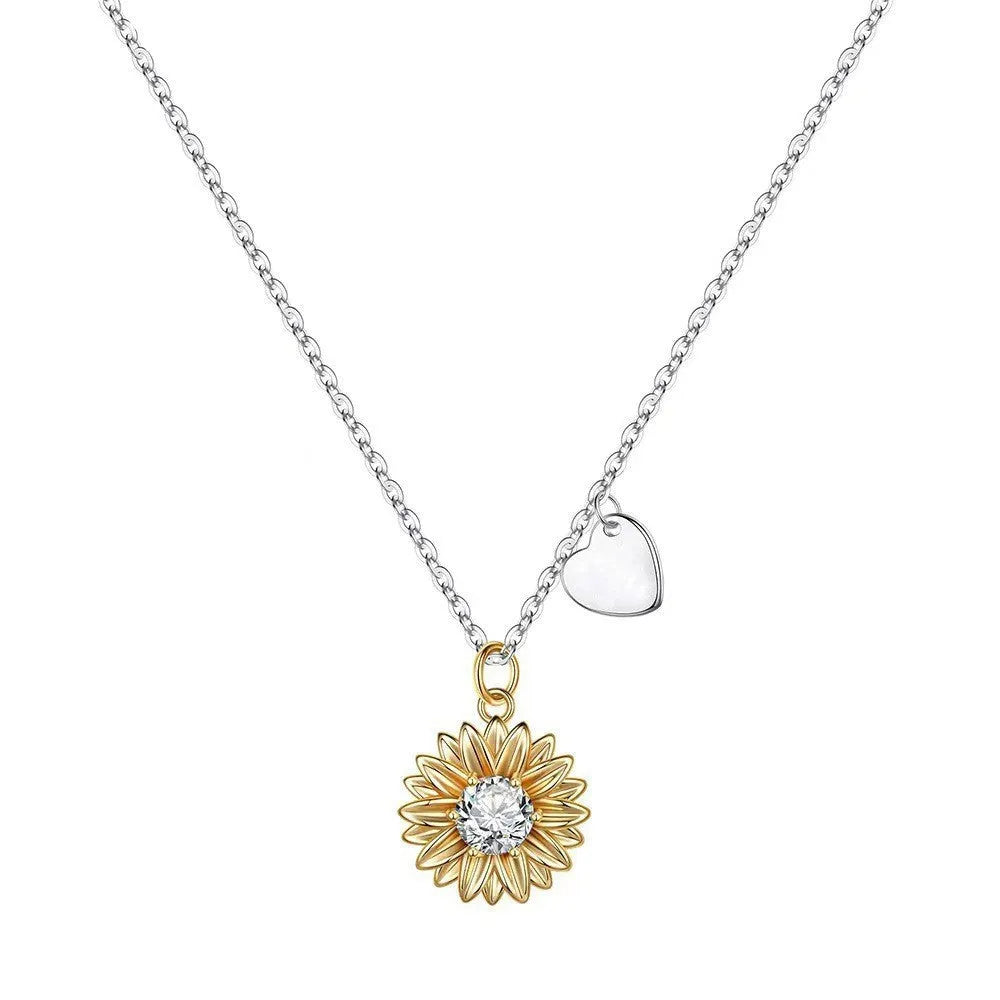 Sunflower pendant necklace in 925 silver on adjustable chain showing geometric petal details