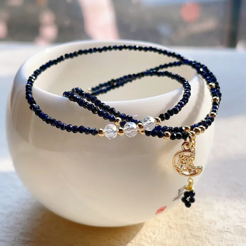 Women's blue sand stone three-ring multi-layer bracelet showing interconnected design