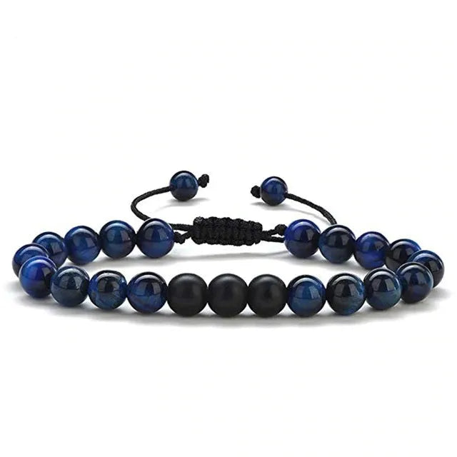 A pair of matte black agate bead bracelets with geometric design for him and her.