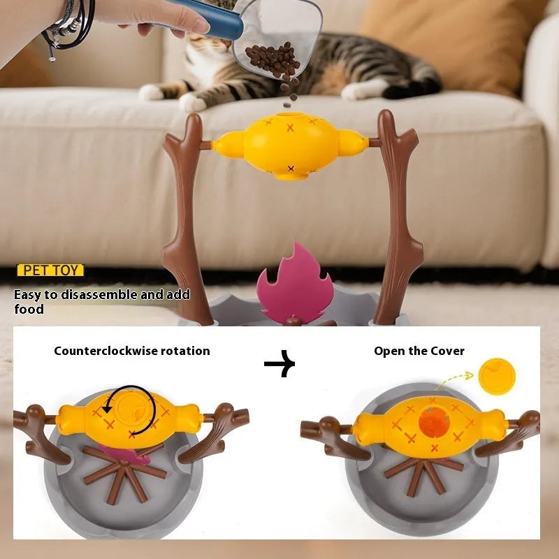 Barbecue-style tumbling interactive cat feeder toy with food compartments, 30cm cube.