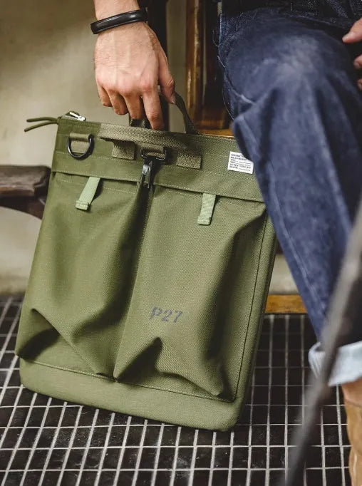 Marden Tooling charcoal black nylon canvas messenger bag with shoulder strap shown open.