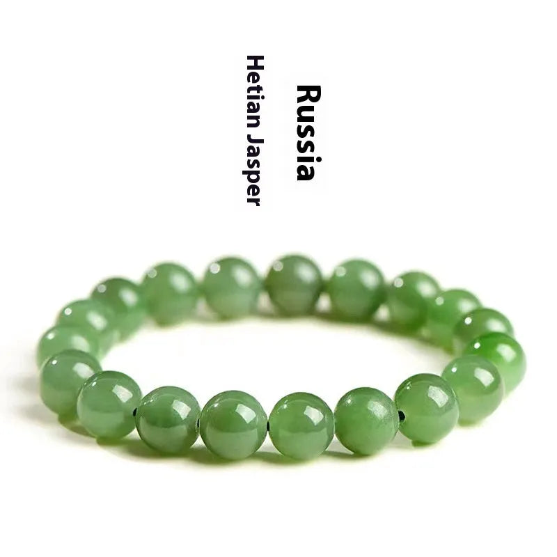 Natural jasper bead bracelet with polished spherical beads on a string, available in multiple sizes.