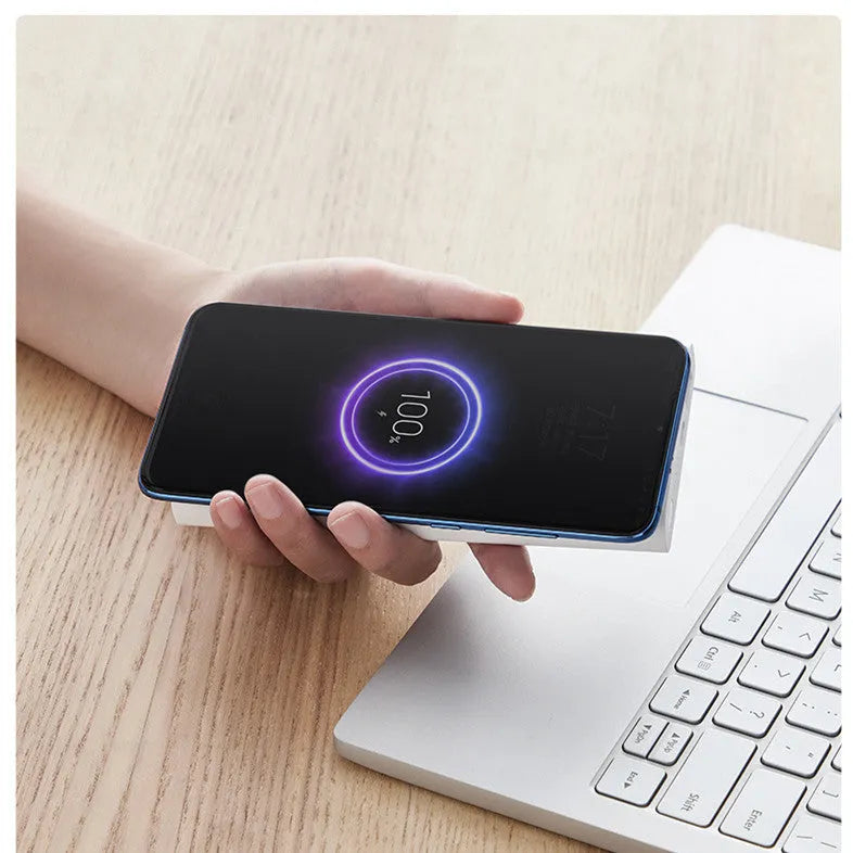 White or black 10000mAh power bank with USB-C port and wireless charging