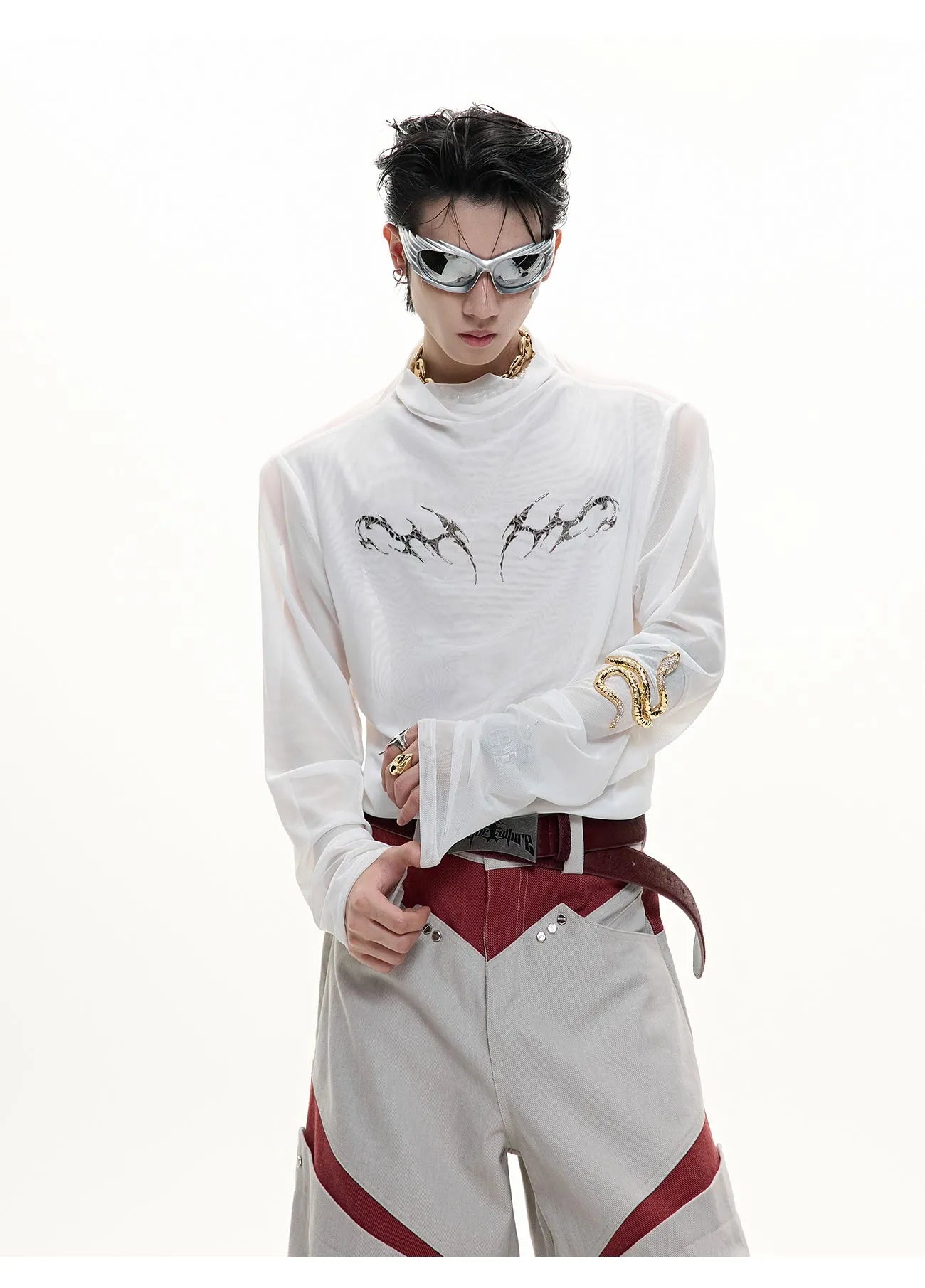 Slim fit black mesh bottoming shirt with long sleeves on a mannequin
