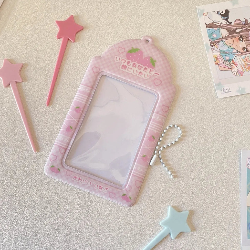 Cartoon strawberry and four-leaf clover PVC card holder pendants for ID and meal cards.