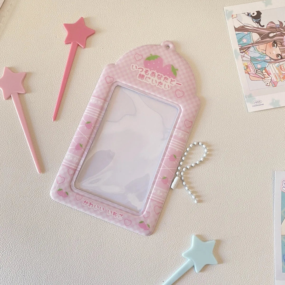 Cartoon strawberry and four-leaf clover PVC card holder pendants for ID and meal cards.