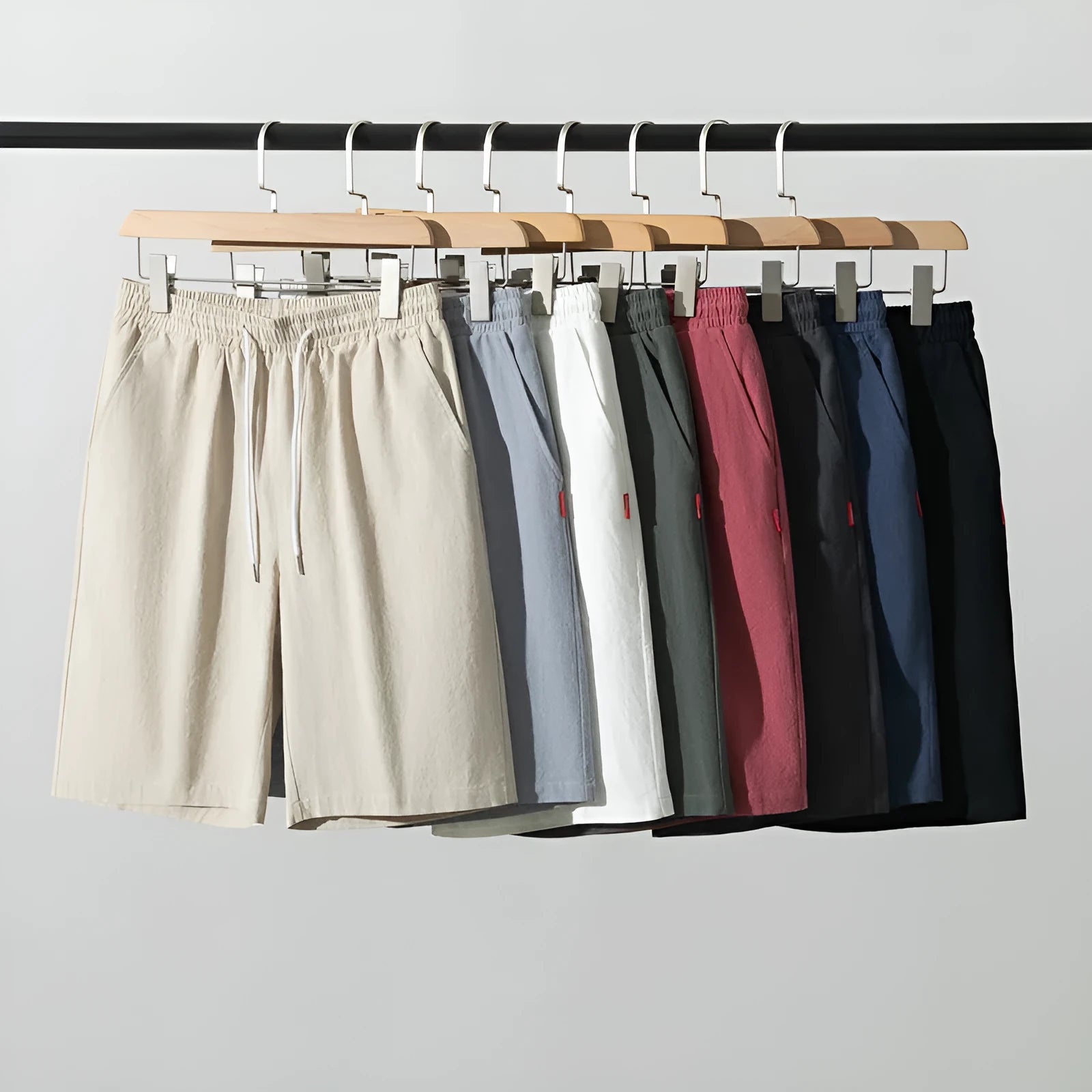 Cotton and linen cropped trousers with drawstring waist in solid colour on hanger