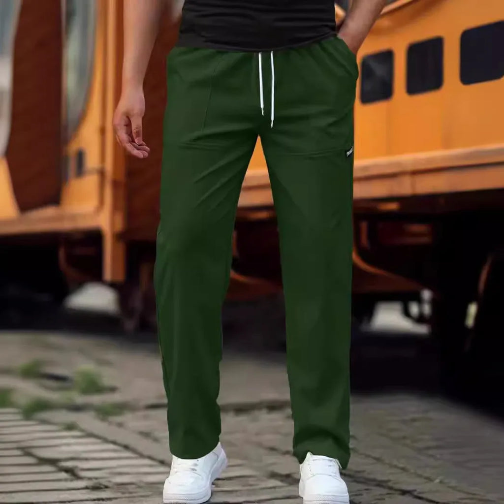 Men's lightweight polyester casual trousers in light grey colour shown flat