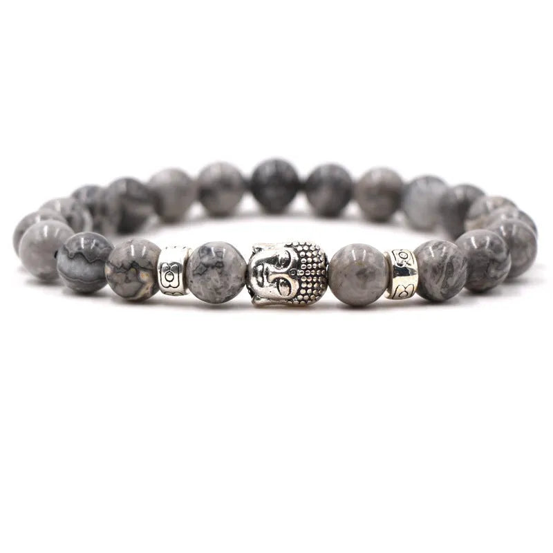 Natural stone stretch bracelet with tigereye, volcanic rock and turquoise beads on wrist