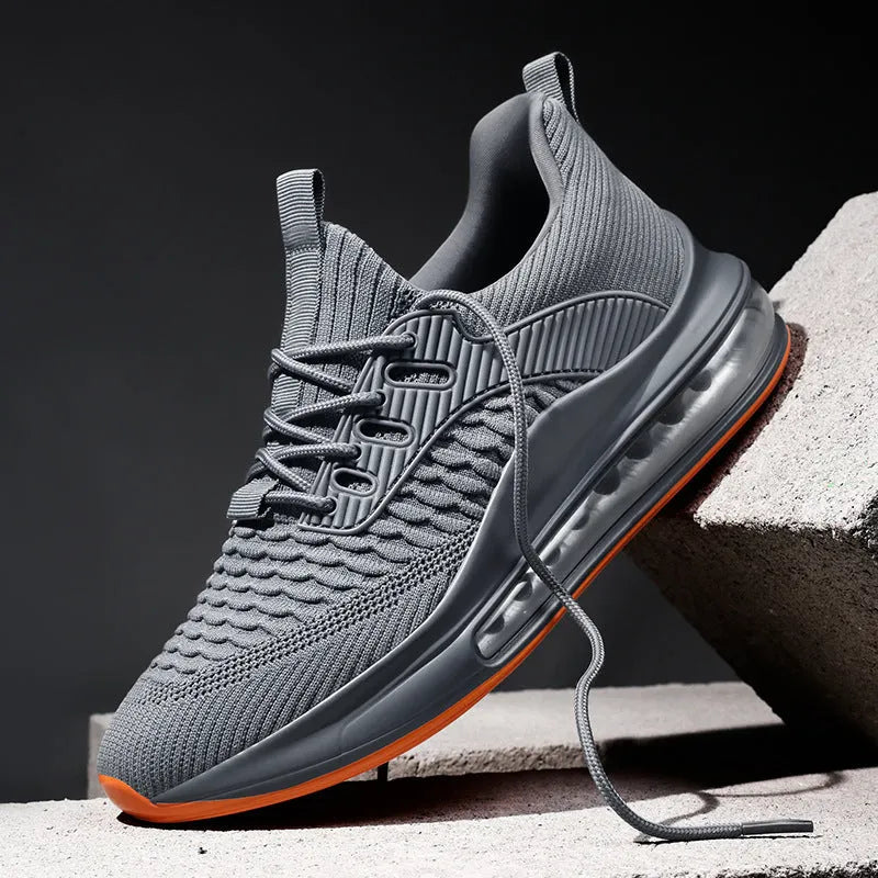 Men's black low-top mesh running sneakers with lace-up front and platform sole