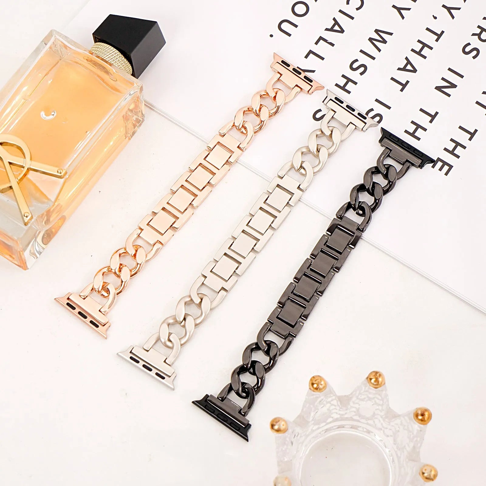 Denim chain link metal Apple Watch replacement strap in silver, black, gold, rose gold, and Starlight colours.