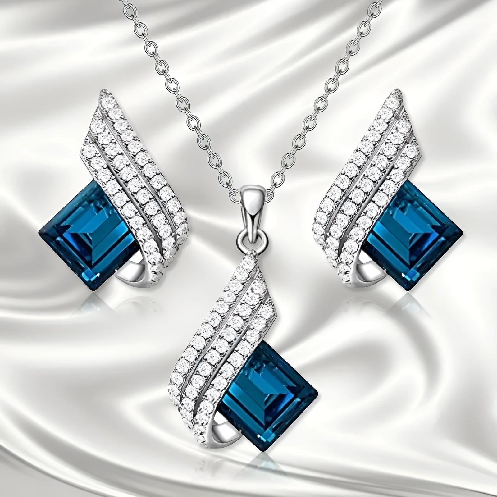Alloy and glass necklace and earring set with cross chain design and electroplated finish