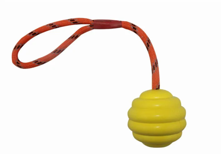 Multi-colour rubber dog ball toy with rope knot handle measuring 6x30cm