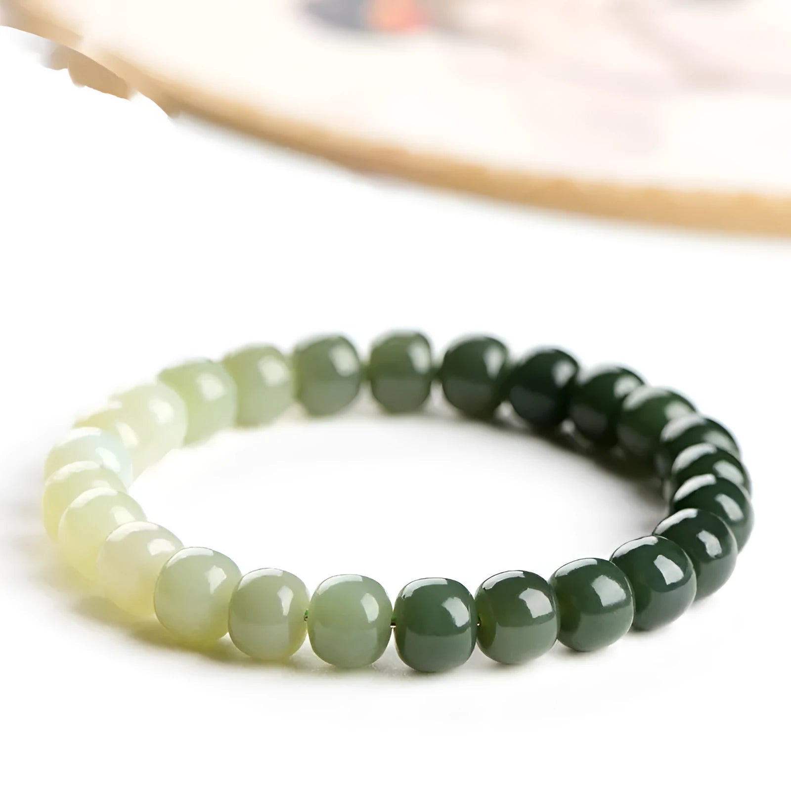 Natural Hetian jade bracelet with water gradient colours in polished beads