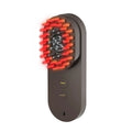Smart massage comb with red light therapy function in pink or black colour options