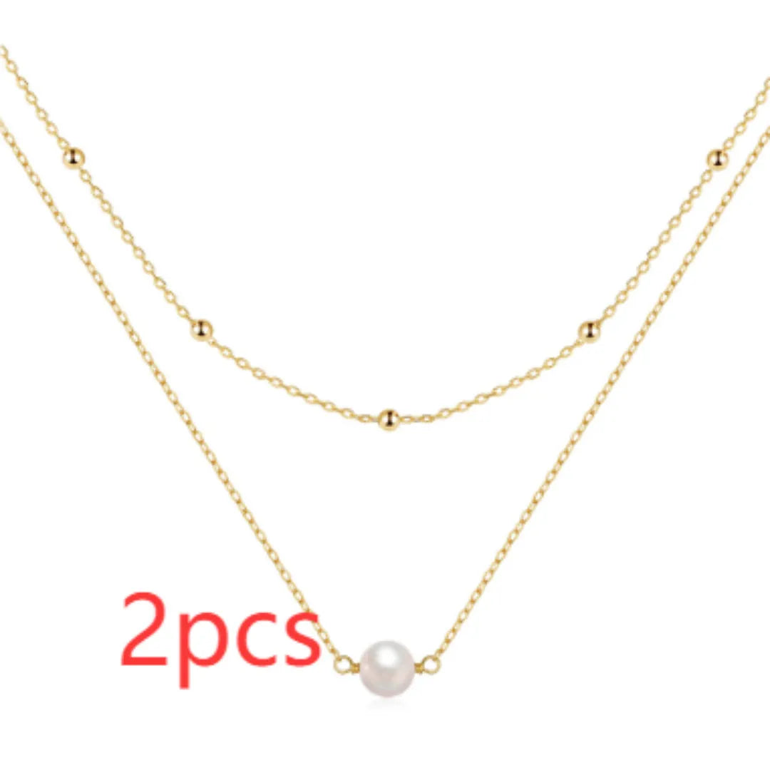 S925 sterling silver double layer necklace with twin pearls and geometric pendant in gold plating