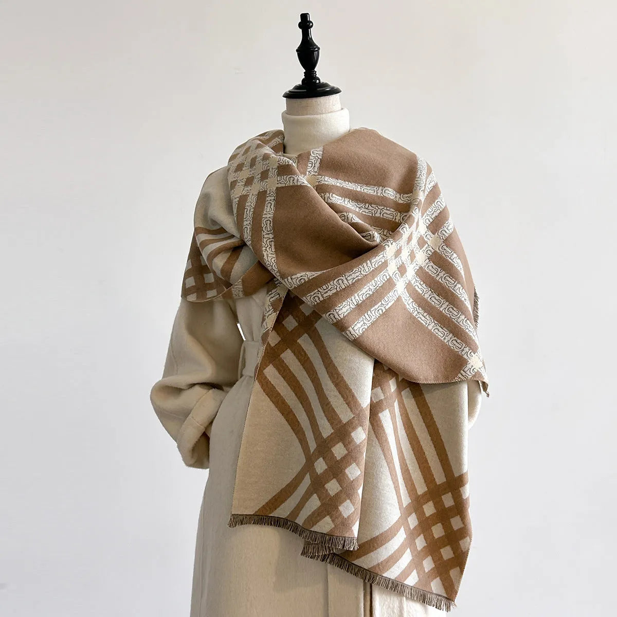 Long brown imitation cashmere scarf with tassels laid flat, showing its 185cm length.
