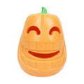 Orange Halloween pumpkin-shaped rubber dog chew toy with a treat-dispensing funnel hole.