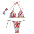 Multicolour printed women's triangle bikini set with hanging neck top and separate bottoms.