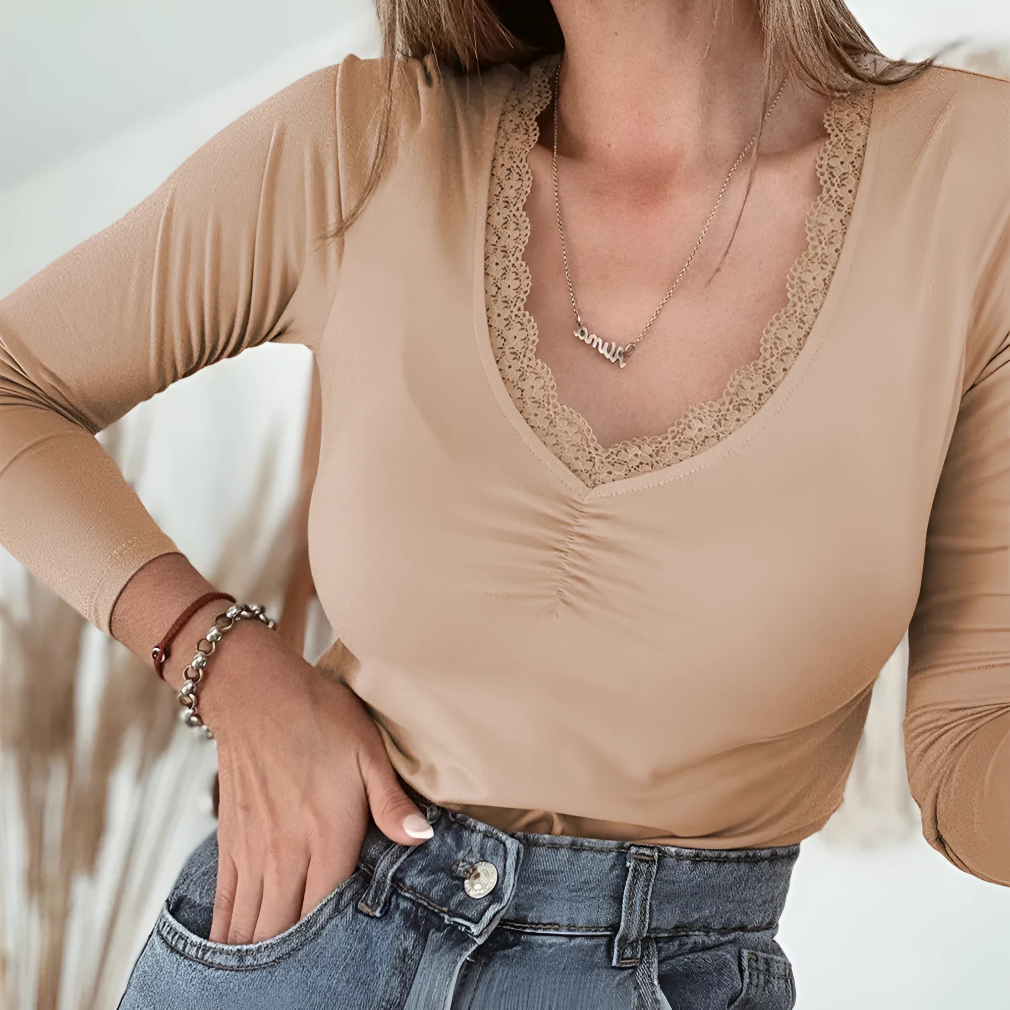 Women's red long sleeve casual top with lace trim detail and slim fit silhouette