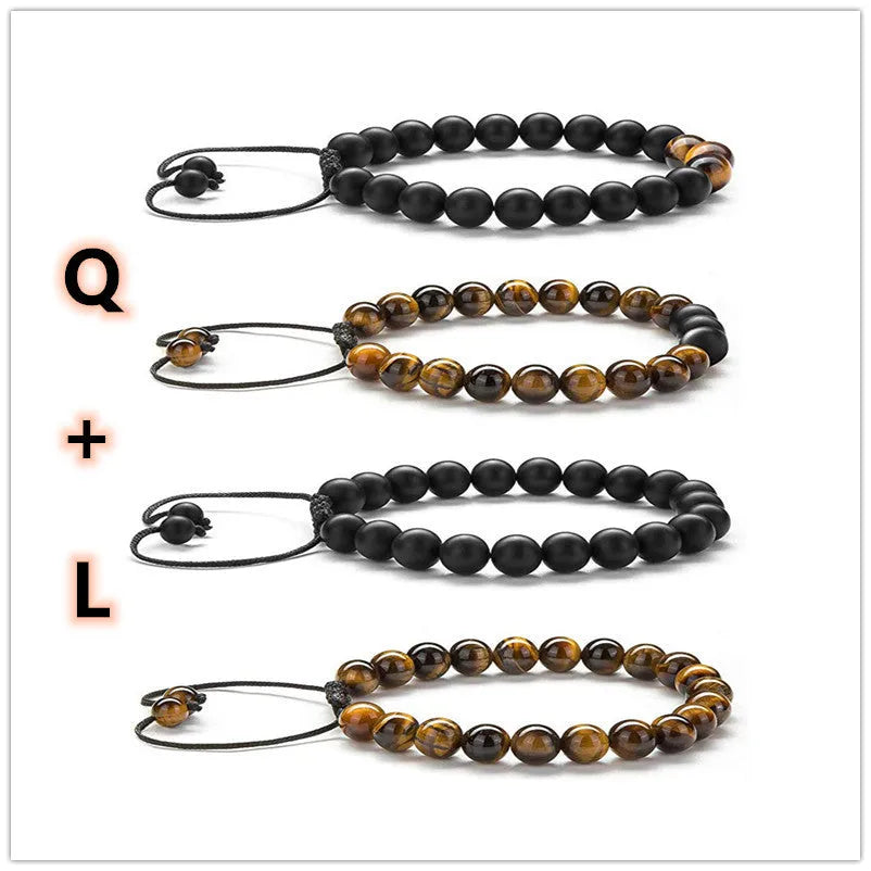 A pair of matte black agate bead bracelets with geometric design for him and her.